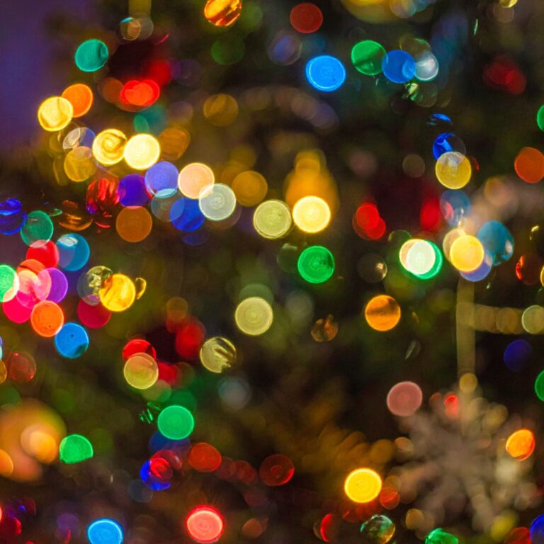 Out of focus Christmas lights creating a warm, reflective holiday atmosphere